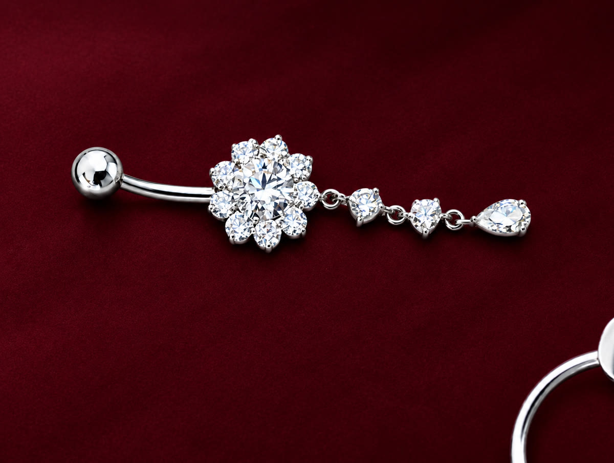 Neuer Piercingschmuck aus Weißgold: Blüte mit Anhänger